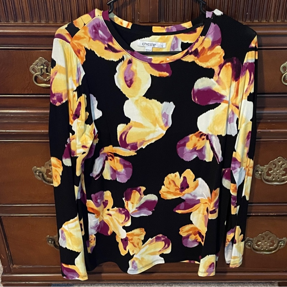 Chico’s top/s 1 medium.  Lovely colors and great with jeans or dressed up.
